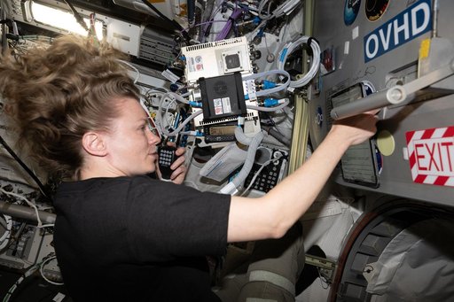 NASA astronaut Zena Cardman speaks on a ham radio with the NixderStelar youth organization