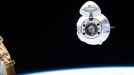 A SpaceX Dragon cargo spacecraft approaches the International Space Station
