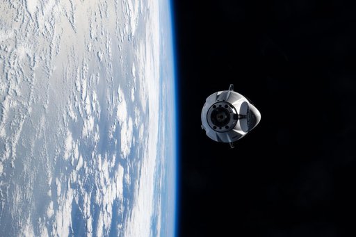 A SpaceX Dragon cargo spacecraft approaches the International Space Station