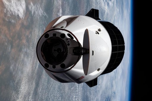 A SpaceX Dragon cargo spacecraft approaches the International Space Station