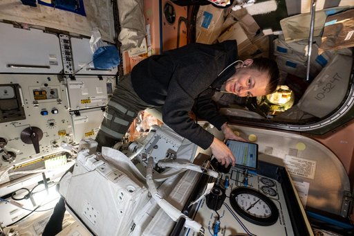 NASA astronaut Zena Cardman works inside the Quest airlock