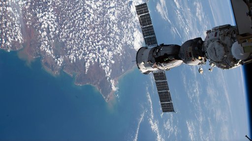 The Soyuz MS-27 spacecraft docked to the Prichal module above Madagascar