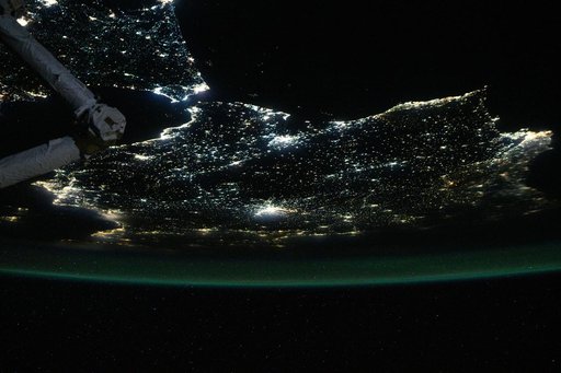 The nightime coastal lights of Morocco and Spain