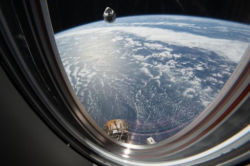 A SpaceX Dragon cargo spacecraft approaches the International Space Station