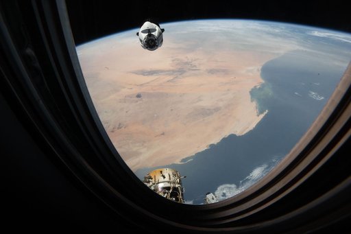 A SpaceX Dragon cargo spacecraft approaches the International Space Station