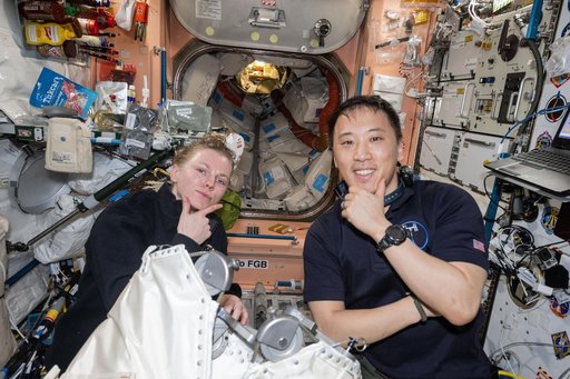 NASA astronauts Zena Cardman and Jonny Kim pose for a fun portrait inside the Unity module