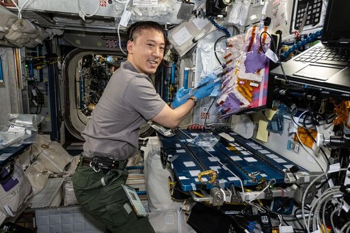 NASA Astronaut Jonny Kim works inside the Harmony module