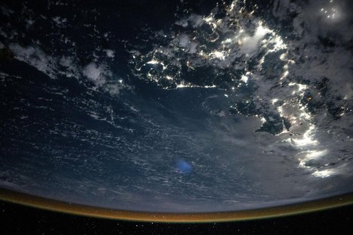 City lights outline southern Japan from Fukuoka to Tokyo