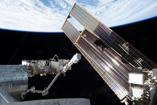 The International Space Station orbits above the Atlantic Ocean off the coast of Portugal