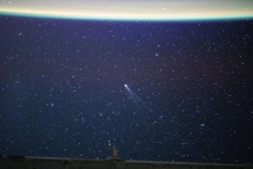 Comet Lemmon appears approximately 55.4 million miles from Earth