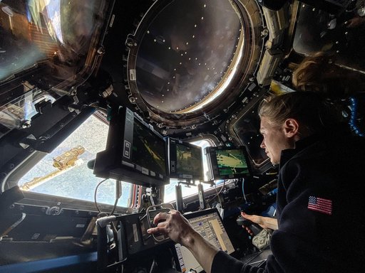 NASA astronaut Zena Cardman practices Canadarm2 robotic maneuvers at the robotics workstation