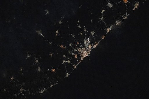 The city lights of Bari, Italy, and its surrounding suburbs