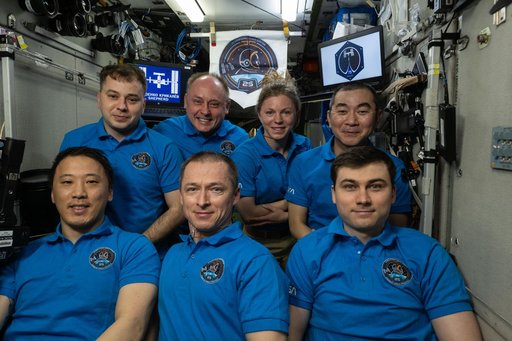 The seven-member Expedition 73 crew poses for a portrait on Nov. 2, 2025