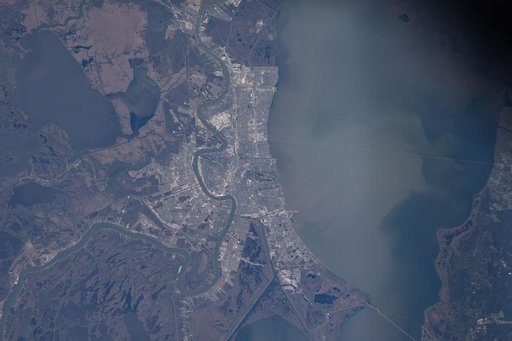 The Mississippi River winds through New Orleans, Louisiana, and its suburbs