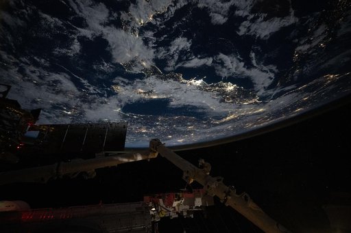 City lights outline the boot of Italy