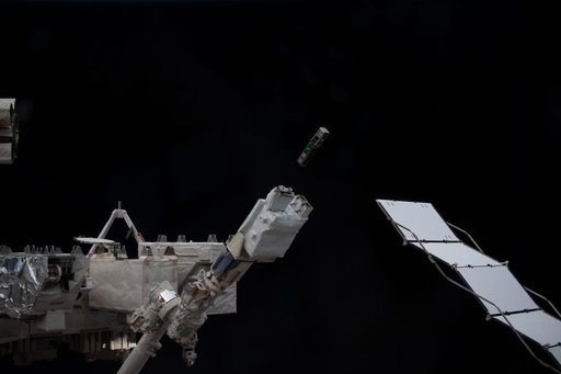 A trio of CubeSats is deployed into Earth orbit outside of the International Space Station