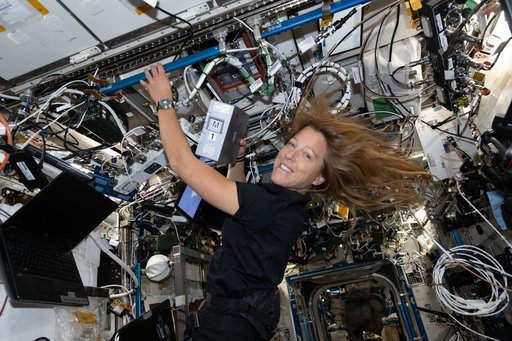 ESA astronaut Sophie Adenot swaps sample processing hard drives