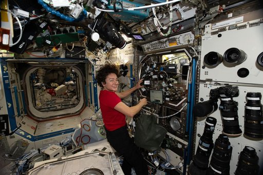 NASA astronaut Jessica Meir configures the Microgravity Science Glovebox