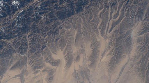The far western edge of the Taklamakan Desert meets the Pamir Mountains in China