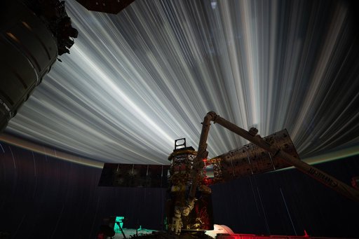 Star trails and city lights streak above the India-Pakistan border