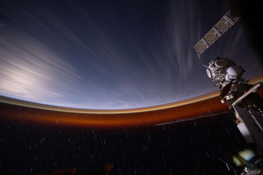 The International Space Station soars above the Pacific Ocean