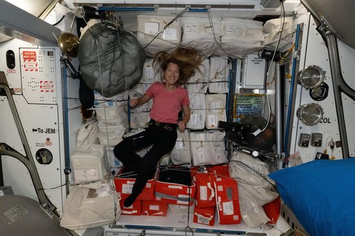 ESA astronaut Sophie Adenot is pictured during cargo stowage activities