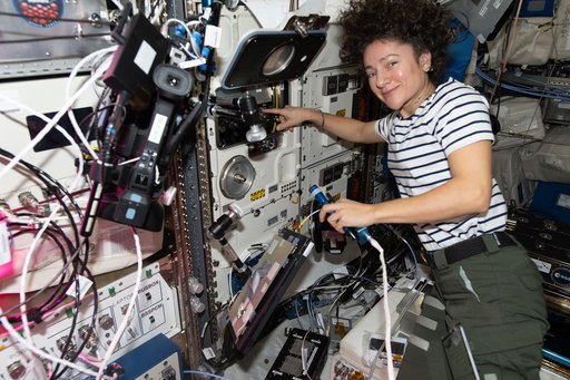 Astronaut Jessica Meir swapps scientific hardware inside the BioLab research incubator