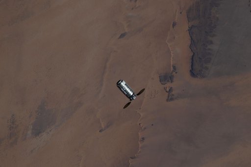 The Cygnus XL cargo spacecraft approaches the International Space Station above the Sahara