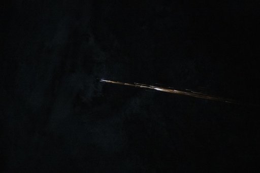 A piece of unidentified space debris is pictured from the International Space Station