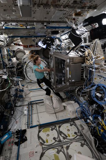 ESA astronaut Sophie Adenot activates the Kibo laboratory module's Life Science Glovebox