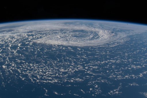 A mesoscale low‑pressure system spins in the South Pacific Ocean