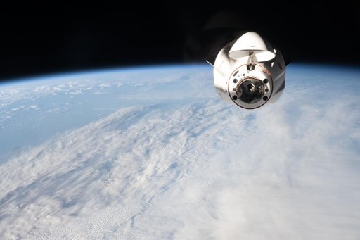 A SpaceX Dragon cargo spacecraft approaches the International Space Station