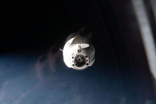 A SpaceX Dragon cargo spacecraft approaches the International Space Station