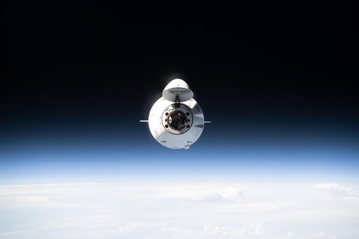 A SpaceX Dragon cargo spacecraft approaches the International Space Station