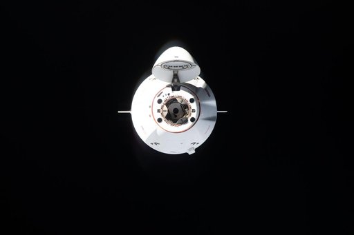 A SpaceX Dragon cargo spacecraft approaches the International Space Station
