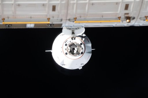 A SpaceX Dragon cargo spacecraft approaches the International Space Station