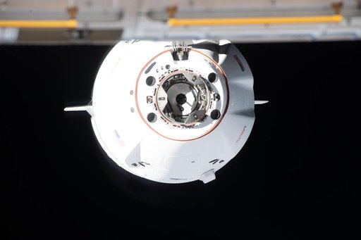 A SpaceX Dragon cargo spacecraft approaches the International Space Station