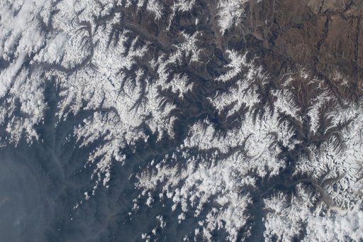 The snow‑capped Himalayas separate Nepal from China