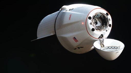 A SpaceX Dragon cargo spacecraft approaches the International Space Station