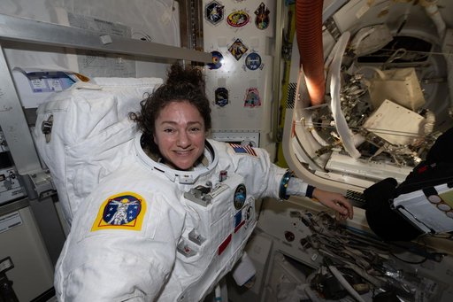 NASA astronaut Jessica Meir tries on her spacesuit