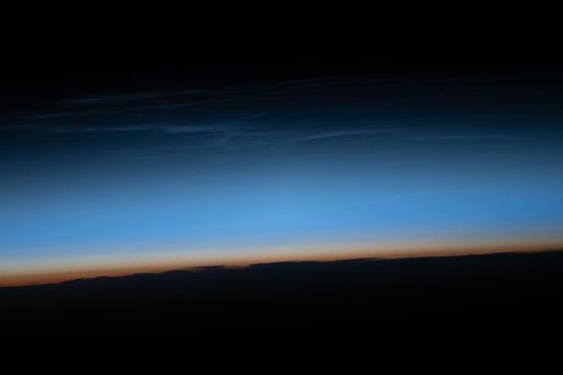 Noctilucent clouds are illuminated by sunlight just after the Sun has set below the horizon