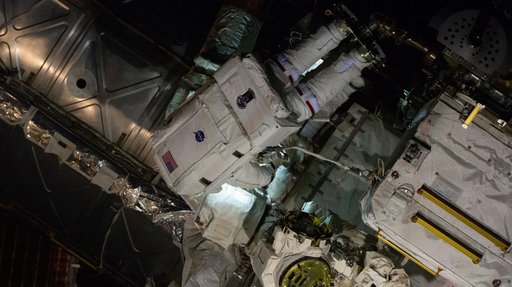 NASA astronaut Chris Williams works outside the International Space Station during a spacewalk