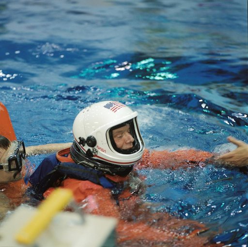 Preflight coverage of STS-116 during emergency bailout training. NBL
