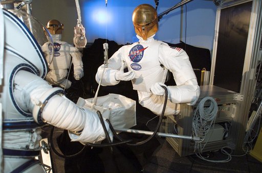 Robonaut joint task operations with astronaut Nancy Currie.