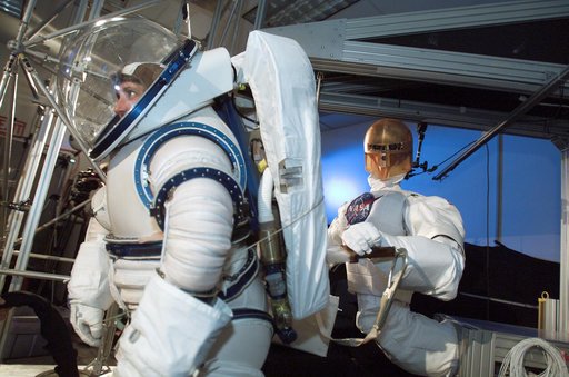 Robonaut joint task operations with astronaut Nancy Currie.