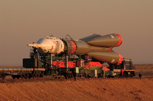 Soyuz TMA-3 and booster rocket transport and raise on launch pad at Baikonur Cosmodrome