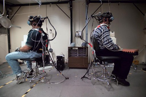 STS-116 Crew Members Training with Expedition 12 in VR Lab