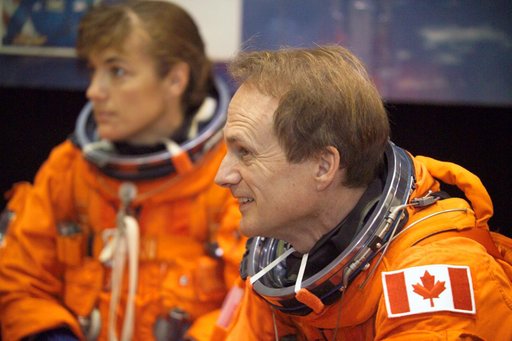 STS-115 crew during suited egress training on the Full Fuselage Trainer (FFT) mockup.