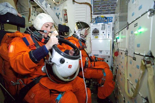 STS-115 crew during crew bailout (91020) training in crew compartment trainer.