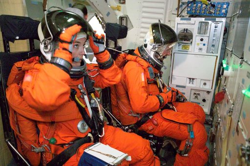 STS-115 crew during crew bailout (91020) training in crew compartment trainer.